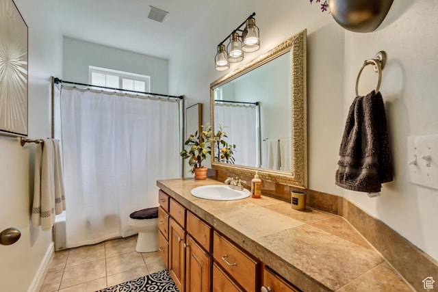bathroom featuring vanity, toilet, tile patterned flooring, and shower / bathtub combination with curtain