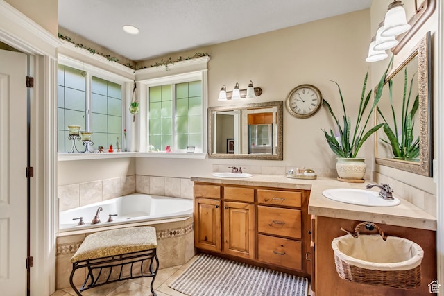 full bath with tile patterned floors, a bath, and double vanity