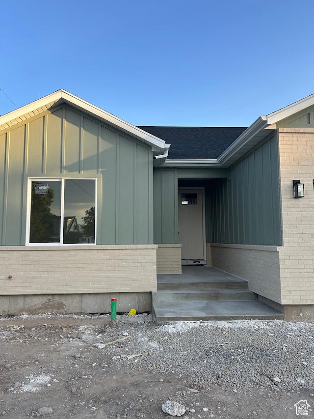 244 E 300 N, Payson, UT 84651 - property entrance with board and batten siding and brick siding
