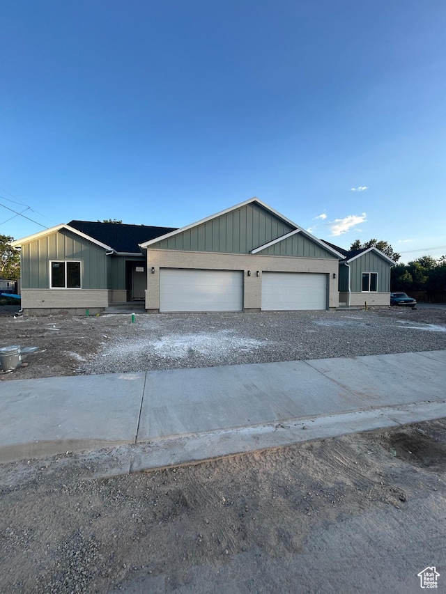 244 E 300 N, Payson, UT 84651 - view of front of property featuring board and batten siding, a garage, and driveway