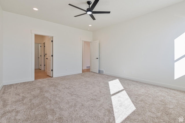 unfurnished bedroom with carpet flooring, baseboards, recessed lighting, and ceiling fan