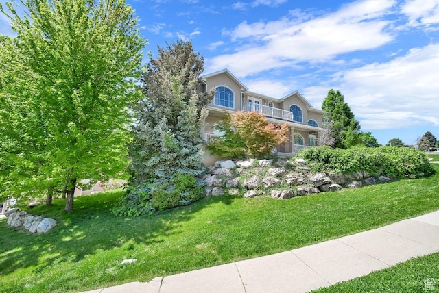 1159 E 5700 S, South Ogden, UT 84405 - view of front facade with a front lawn and a balcony
