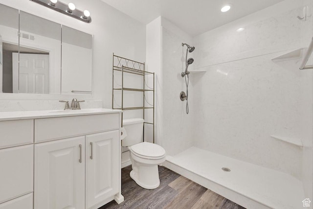 1159 E 5700 S, South Ogden, UT 84405 - full bath with toilet, wood finished floors, a shower, and vanity