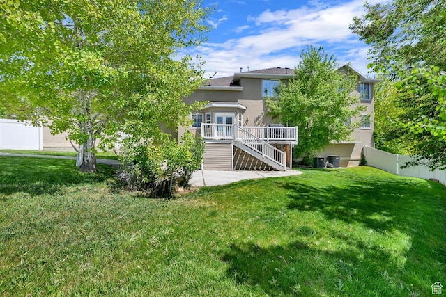 1159 E 5700 S, South Ogden, UT 84405 - back of house with stairway, stucco siding, a deck, central AC unit, and a patio