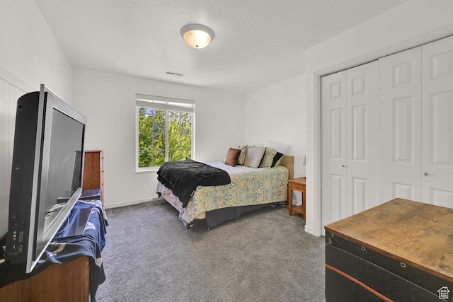 1159 E 5700 S, South Ogden, UT 84405 - bedroom featuring carpet, a closet, baseboards, and a textured ceiling