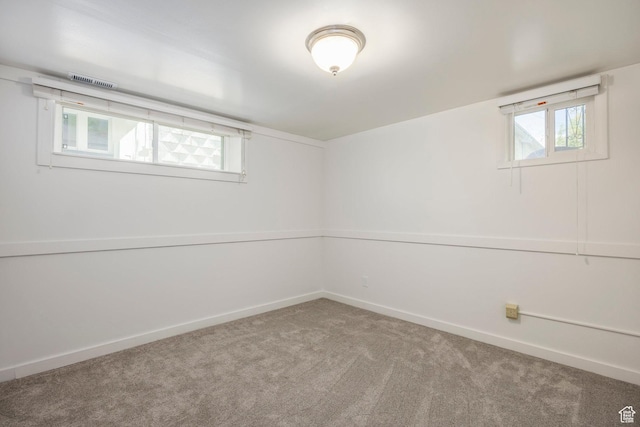 basement featuring carpet and baseboards
