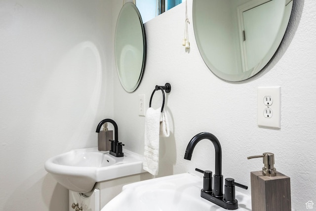 half bathroom with a sink