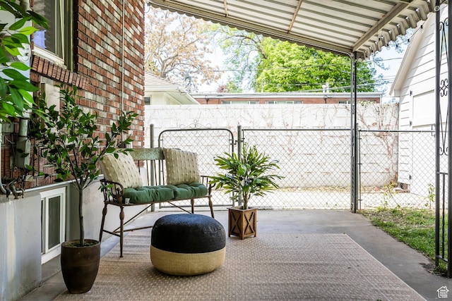 view of patio featuring fence