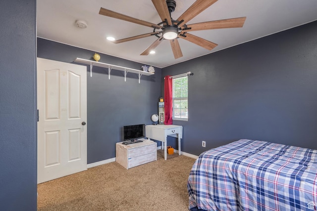 carpeted bedroom featuring baseboards, ceiling fan, and recessed lighting