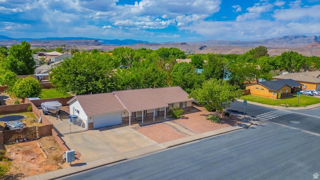 view from above of property with a mountainous background