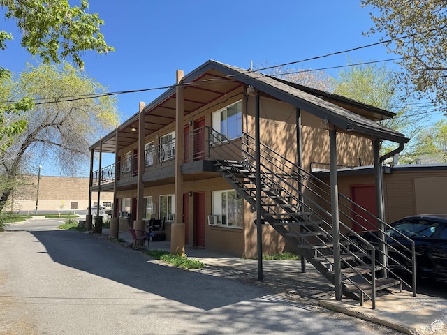 241 N 800 W, Salt Lake City, UT 84116 - view of side of home featuring stairway