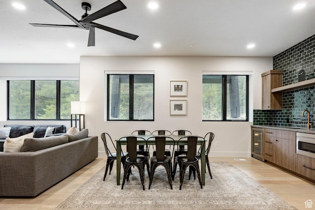 9335 N Canopy Ln E, Sundance, UT 84604 - dining space with a ceiling fan, recessed lighting, light wood-type flooring, baseboards, and beverage cooler