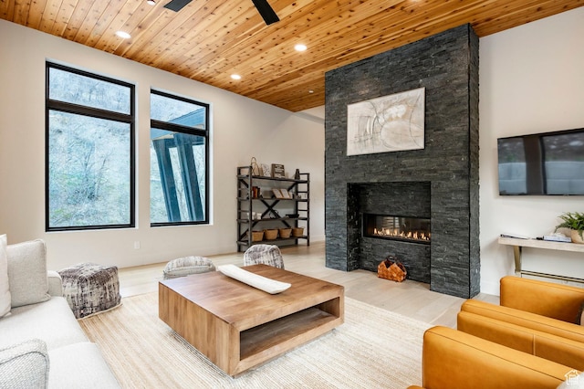 9335 N Canopy Ln E, Sundance, UT 84604 - living area featuring wooden ceiling, recessed lighting, wood finished floors, a fireplace, and a ceiling fan