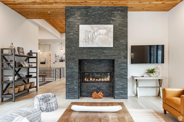 9335 N Canopy Ln E, Sundance, UT 84604 - living area featuring wooden ceiling, a fireplace, and wood finished floors