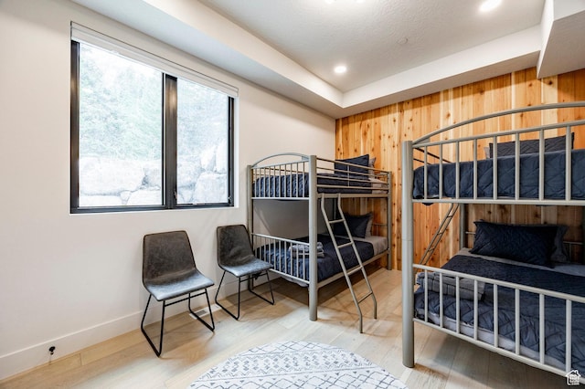 9335 N Canopy Ln E, Sundance, UT 84604 - bedroom featuring wood walls, wood finished floors, recessed lighting, and baseboards