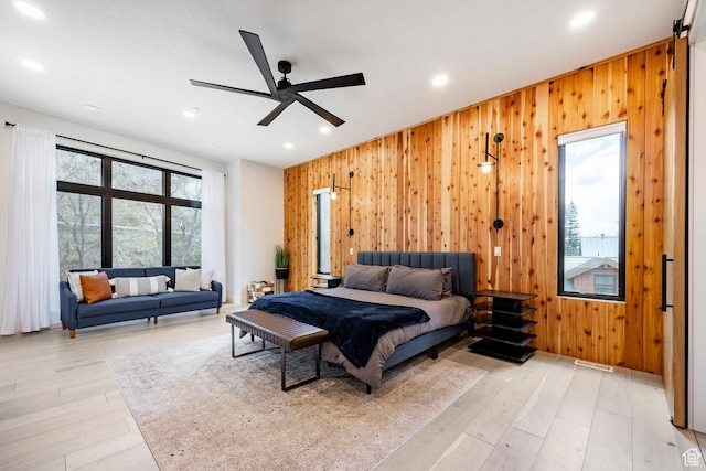 9335 N Canopy Ln E, Sundance, UT 84604 - bedroom featuring wood walls, light wood-style floors, recessed lighting, and a ceiling fan