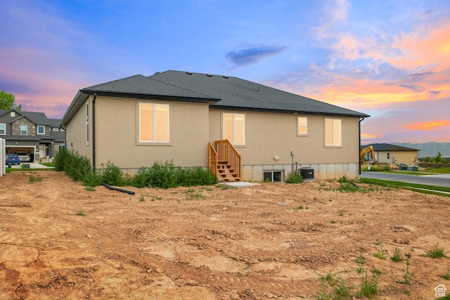 309 N 2350 E Unit 01, Spanish Fork, UT 84660 - rear view of house featuring roof with shingles
