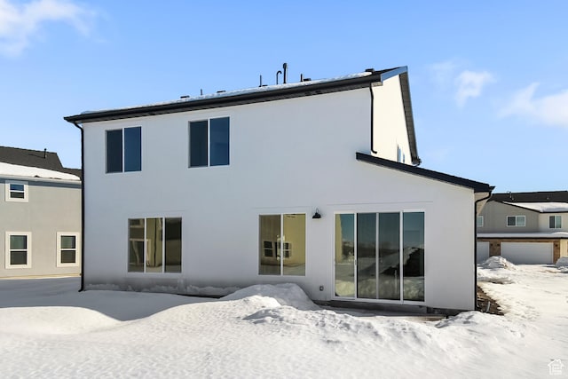 101 N 950 E Unit 36, Tremonton, UT 84337 - snow covered property with stucco siding