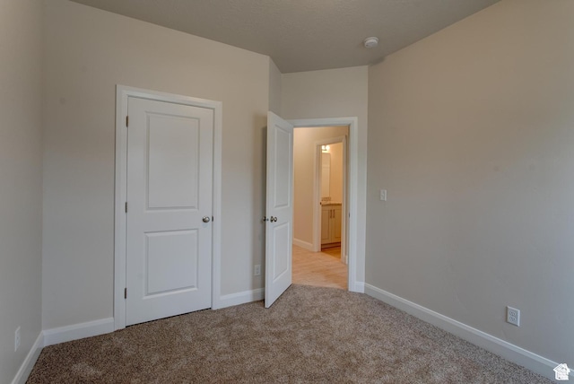 2318 E 320 N Unit 01, Spanish Fork, UT 84660 - unfurnished bedroom featuring carpet and baseboards