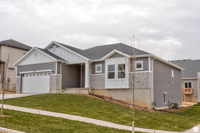 2318 E 320 N Unit 01, Spanish Fork, UT 84660 - craftsman inspired home featuring board and batten siding, stone siding, a garage, and a front yard