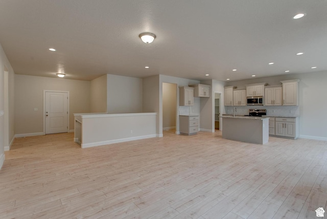 2318 E 320 N Unit 01, Spanish Fork, UT 84660 - unfurnished living room with light wood-type flooring and recessed lighting