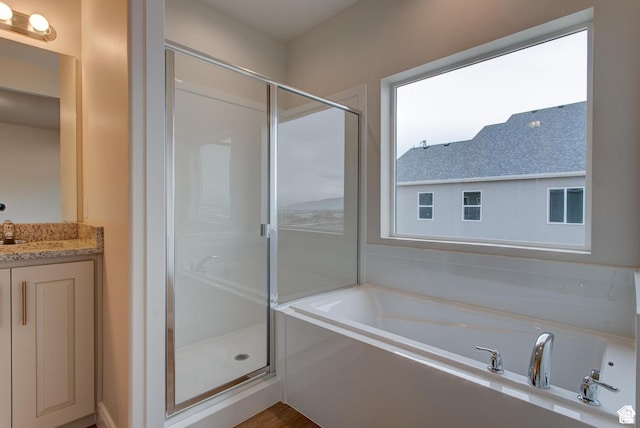 2318 E 320 N Unit 01, Spanish Fork, UT 84660 - bathroom featuring a garden tub, a shower stall, and vanity