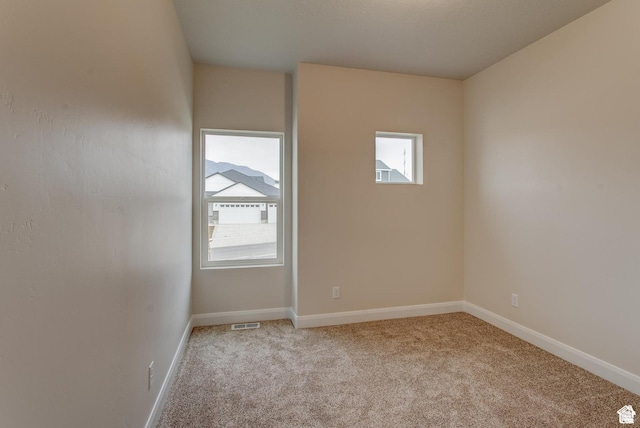 2318 E 320 N Unit 01, Spanish Fork, UT 84660 - spare room featuring light carpet and baseboards
