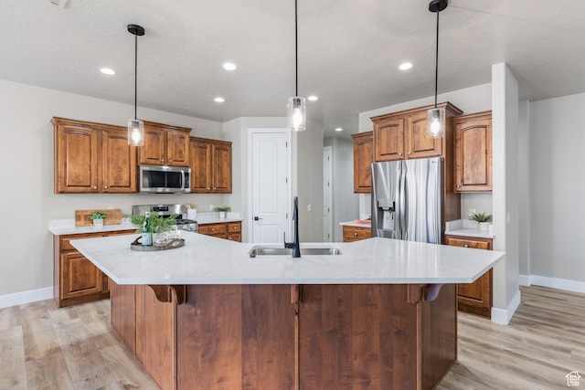 1095 S White Sands Dr, Washington, UT 84780 - kitchen featuring appliances with stainless steel finishes, a sink, baseboards, recessed lighting, and light wood-type flooring