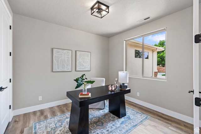 1095 S White Sands Dr, Washington, UT 84780 - office area with wood finished floors and baseboards