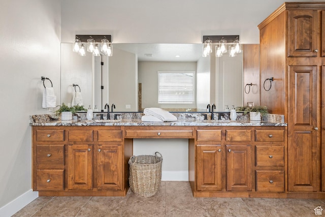 1095 S White Sands Dr, Washington, UT 84780 - bathroom featuring double vanity and baseboards