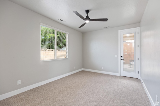 1095 S White Sands Dr, Washington, UT 84780 - spare room featuring carpet flooring, ceiling fan, and baseboards