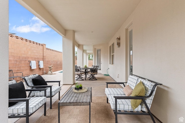 1095 S White Sands Dr, Washington, UT 84780 - view of patio / terrace with fence, outdoor dining area, and an outdoor living space