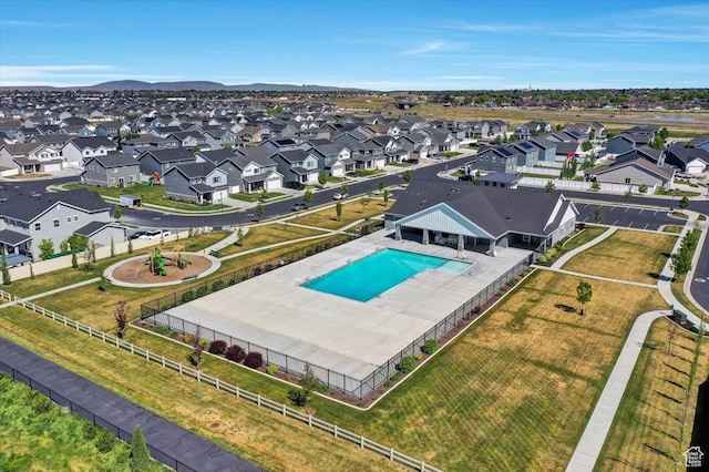 aerial perspective of suburban area with a pool area