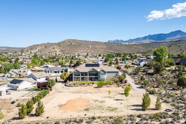 aerial view of residential area with a mountainous background