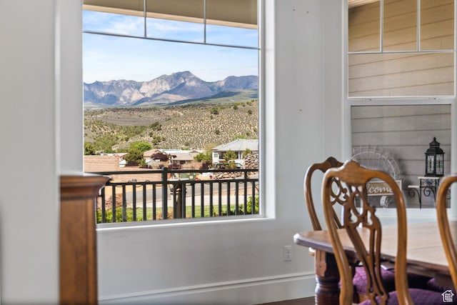 dining area with a mountain view