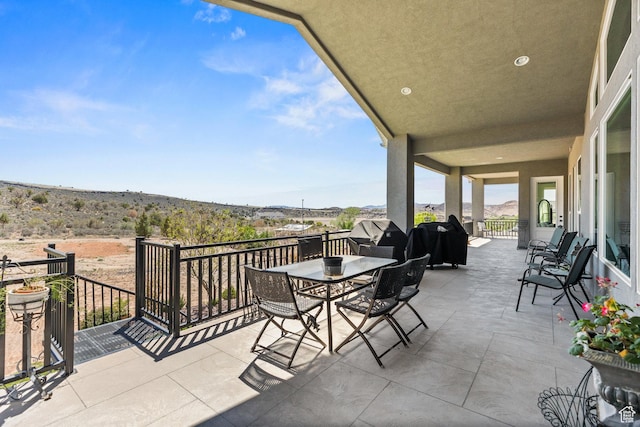 view of patio with outdoor dining area