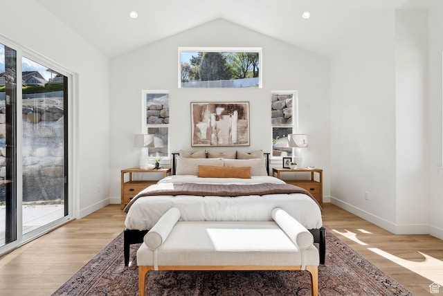 bedroom with access to outside, vaulted ceiling, light wood-style floors, baseboards, and recessed lighting