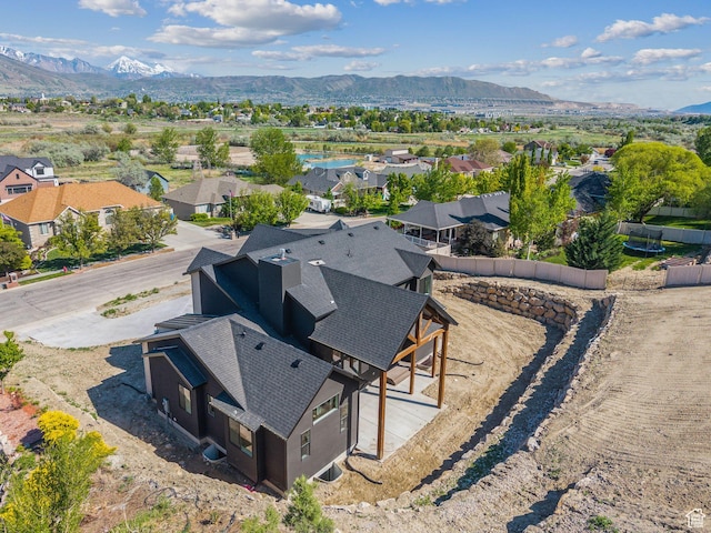 aerial perspective of suburban area with a mountain backdrop