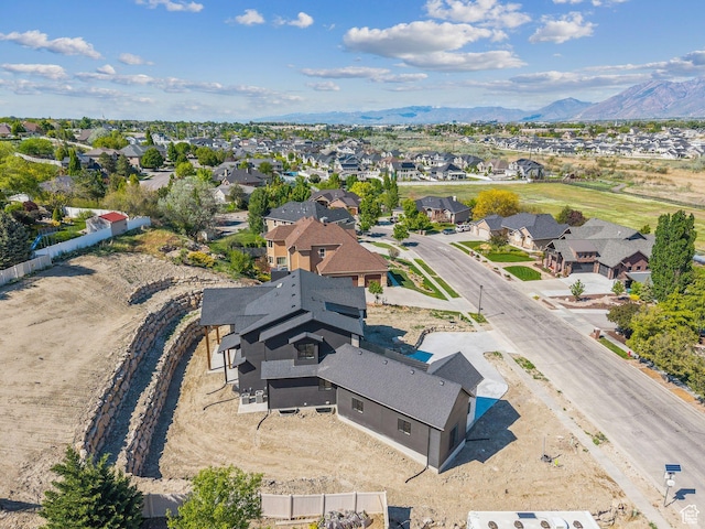 aerial perspective of suburban area with mountains