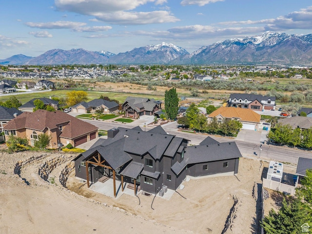 aerial perspective of suburban area featuring mountains