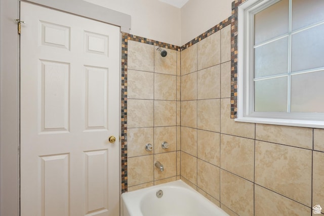 bathroom featuring washtub / shower combination