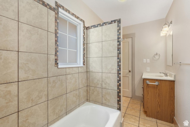 bathroom with tile patterned floors and vanity