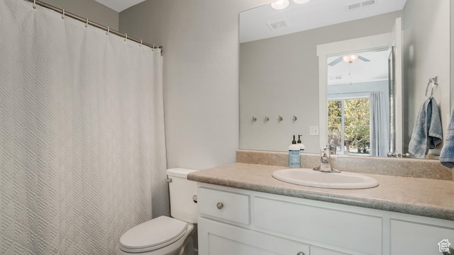 full bathroom with vanity and toilet