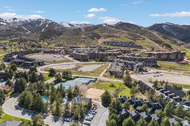 aerial view of property's location with a mountain backdrop