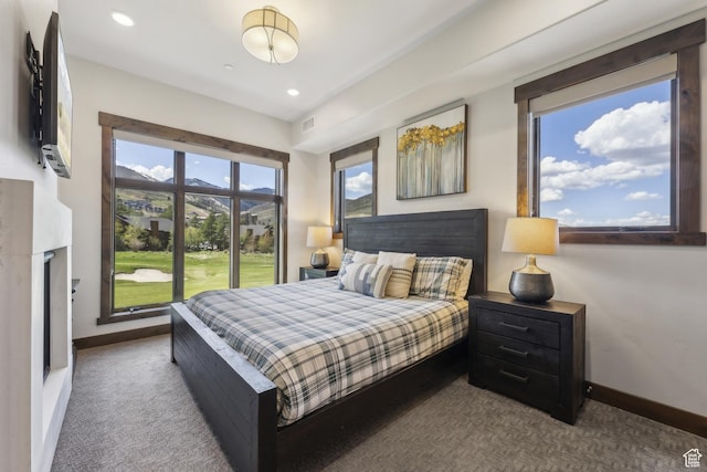carpeted bedroom with baseboards and recessed lighting