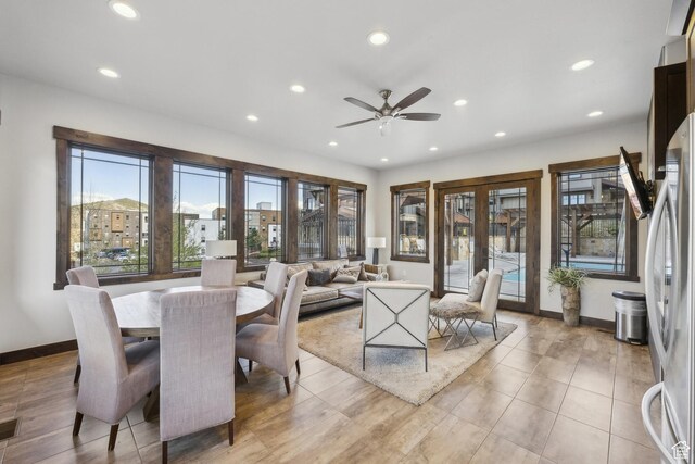 dining space featuring healthy amount of natural light, ceiling fan, recessed lighting, and baseboards