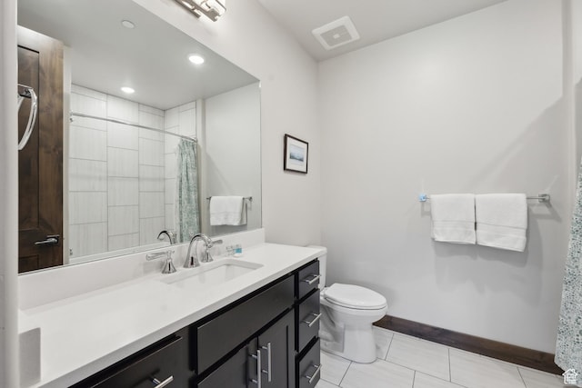 full bath with baseboards, toilet, a shower with shower curtain, vanity, and tile patterned floors