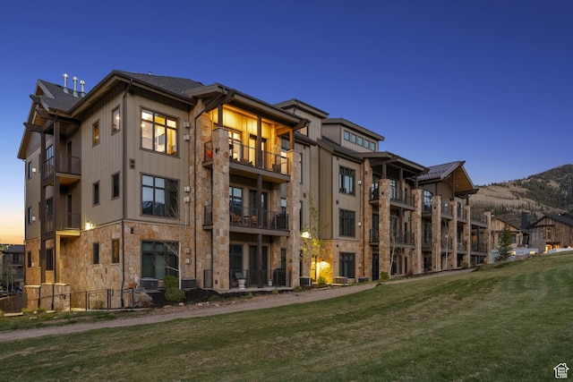 view of property at dusk