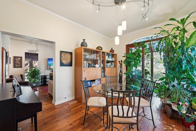 528 N Westcapitol St, Salt Lake City, UT 84103 - dining area with hardwood / wood-style flooring, baseboards, and ornamental molding
