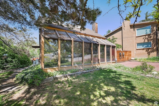 528 N Westcapitol St, Salt Lake City, UT 84103 - view of grassy yard featuring an exterior structure and an outdoor structure